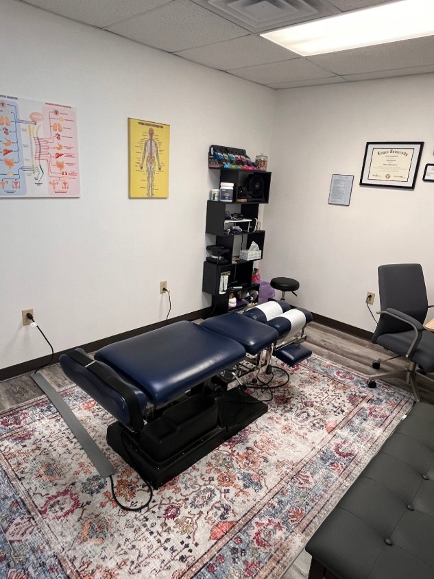 The adjusting room with a chiropractic drop table